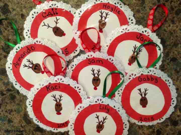 Reindeer fingerprint ornament on a cute little lace circle! Great ornament for a parent or family gift from your students!